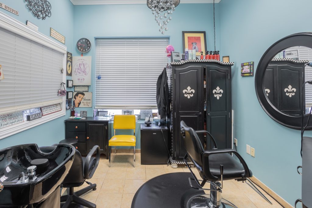 Image representing a beauty business startup journey through salon suite rental, business planning, and success in the Richardson beauty industry.